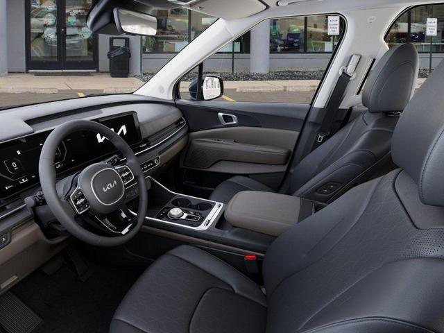 Photo of 2026 Astra Blue Kia Carnival Hybrid