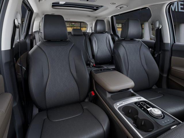 Photo of 2026 Astra Blue Kia Carnival Hybrid