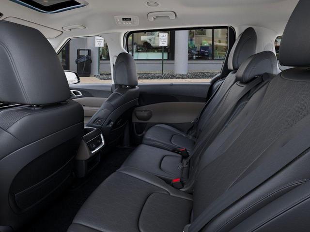 Photo of 2026 Astra Blue Kia Carnival Hybrid