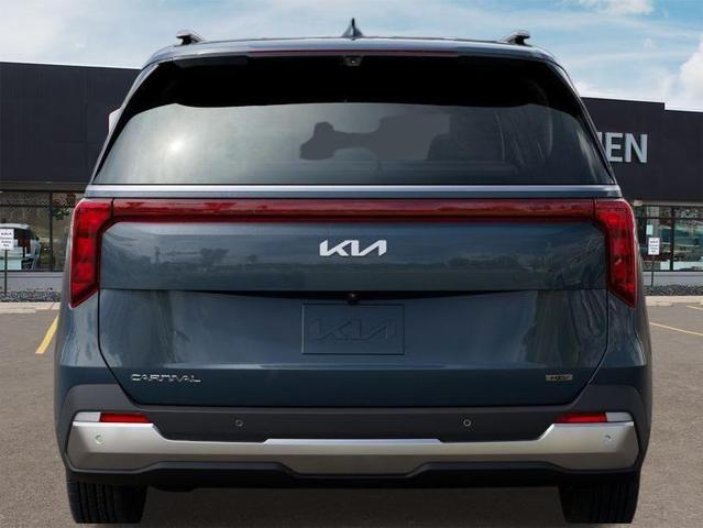 Photo of 2026 Astra Blue Kia Carnival Hybrid