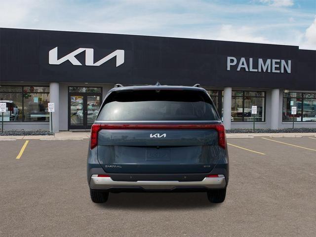 Photo of 2026 Astra Blue Kia Carnival Hybrid
