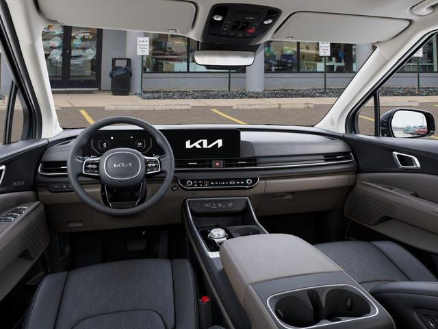 Photo of 2026 Astra Blue Kia Carnival Hybrid