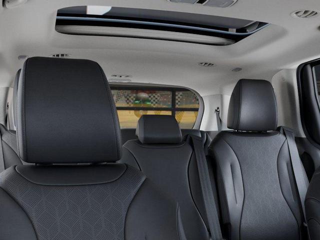 Photo of 2026 Astra Blue Kia Carnival Hybrid