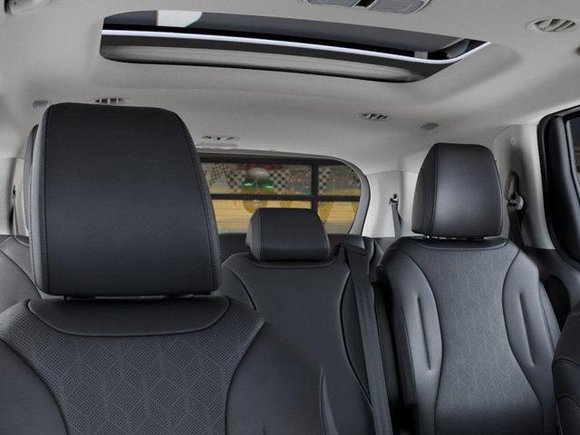Photo of 2026 Snow White Pearl Kia Carnival Hybrid