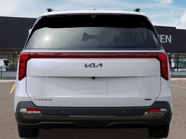 Photo of 2026 Snow White Pearl Kia Carnival Hybrid