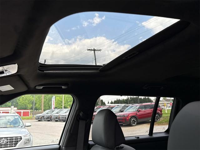 Photo of 2025 Serenity White Hyundai SANTA FE HEV