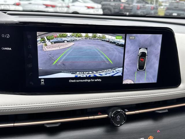 Photo of 2024 Dark Bluish Green Metallic Nissan ARIYA