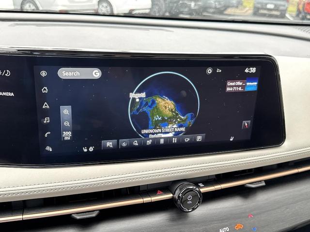 Photo of 2024 Dark Bluish Green Metallic Nissan ARIYA