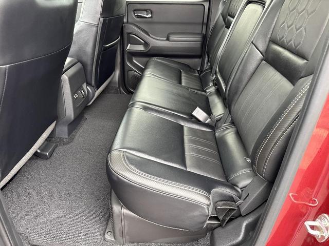 Photo of 2024 Cardinal Red Metallic Nissan Frontier