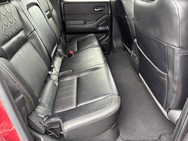 Photo of 2024 Cardinal Red Metallic Nissan Frontier