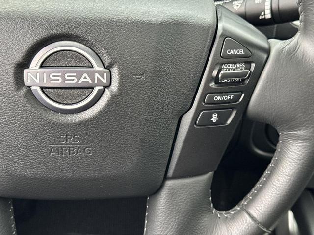Photo of 2024 Cardinal Red Metallic Nissan Frontier