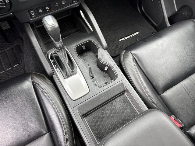 Photo of 2024 Cardinal Red Metallic Nissan Frontier