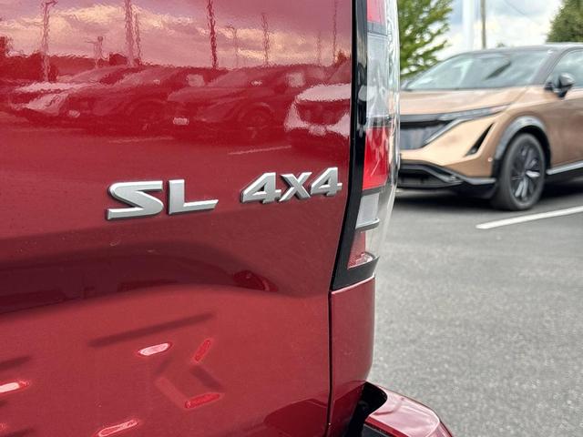 Photo of 2024 Cardinal Red Metallic Nissan Frontier