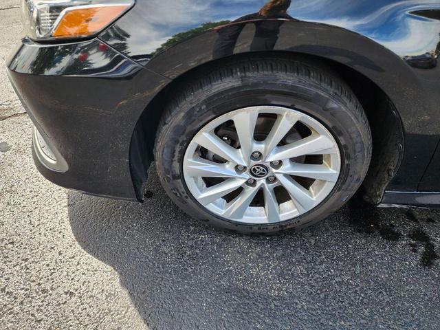 Photo of 2023 Midnight Black Metallic Toyota Camry