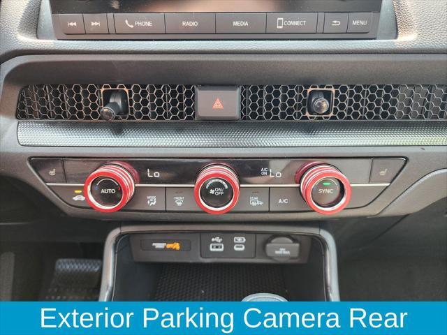 Photo of 2025 Radiant Red Metallic Honda CR-V