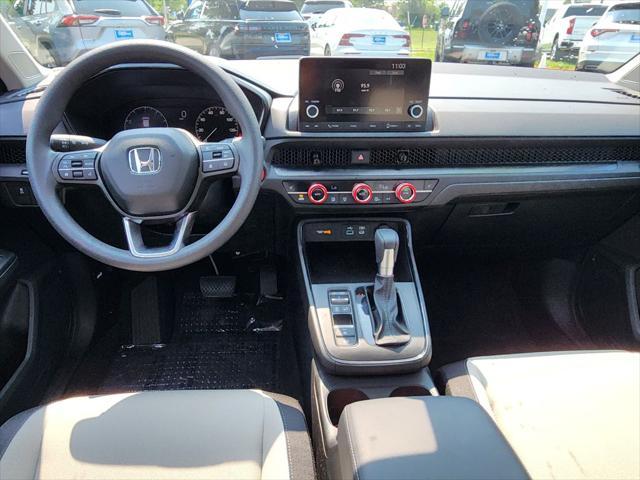 Photo of 2025 Radiant Red Metallic Honda CR-V