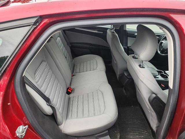 Photo of 2016 Ruby Red Metallic Tinted Clearcoat Ford Fusion