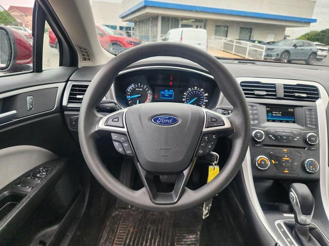 Photo of 2016 Ruby Red Metallic Tinted Clearcoat Ford Fusion