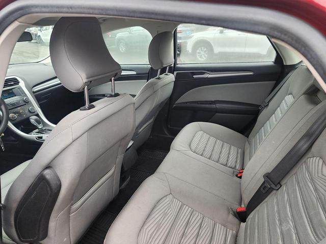 Photo of 2016 Ruby Red Metallic Tinted Clearcoat Ford Fusion