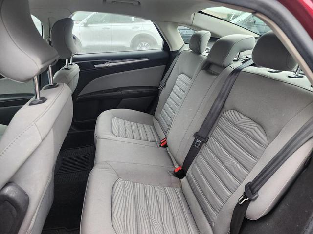 Photo of 2016 Ruby Red Metallic Tinted Clearcoat Ford Fusion