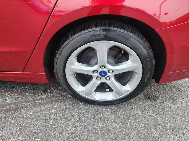 Photo of 2016 Ruby Red Metallic Tinted Clearcoat Ford Fusion