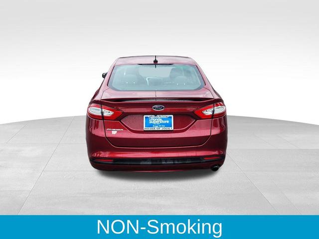 Photo of 2016 Ruby Red Metallic Tinted Clearcoat Ford Fusion