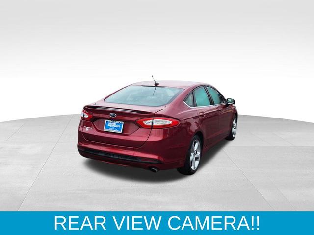 Photo of 2016 Ruby Red Metallic Tinted Clearcoat Ford Fusion