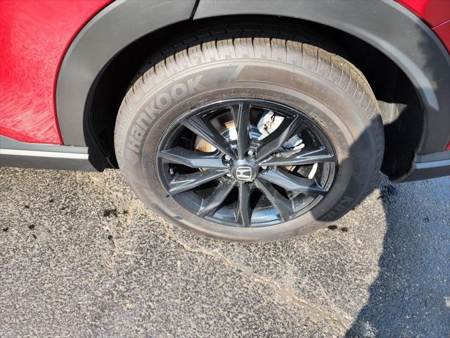 Photo of 2025 Radiant Red Metallic Honda CR-V Hybrid