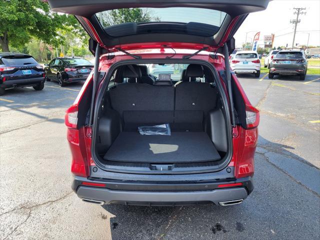 Photo of 2025 Radiant Red Metallic Honda CR-V Hybrid