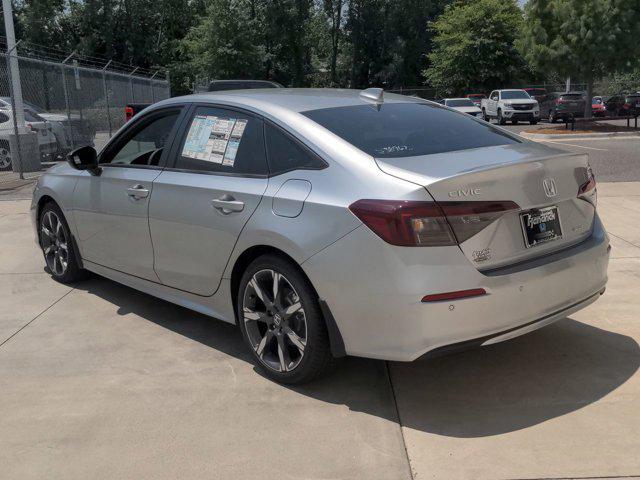 Photo of 2025 Solar Silver Metallic Honda Civic Hybrid