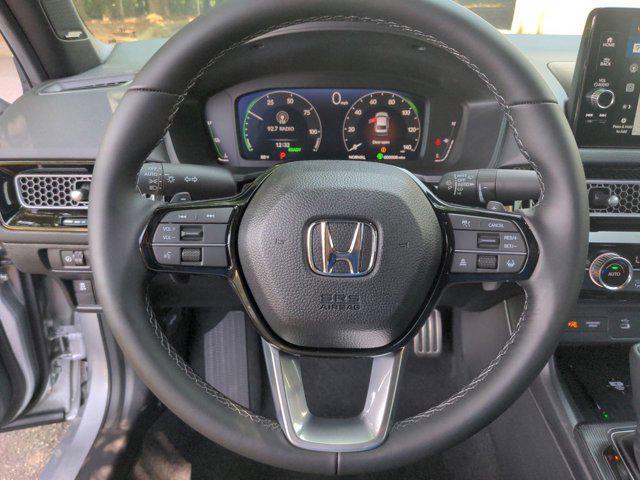 Photo of 2025 Solar Silver Metallic Honda Civic Hybrid