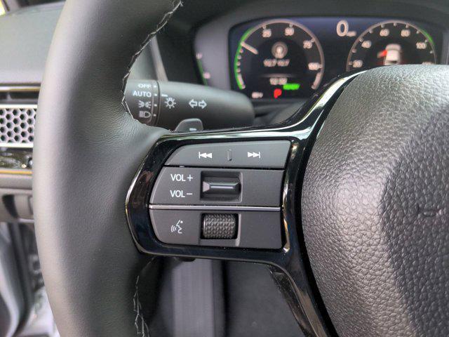 Photo of 2025 Solar Silver Metallic Honda Civic Hybrid
