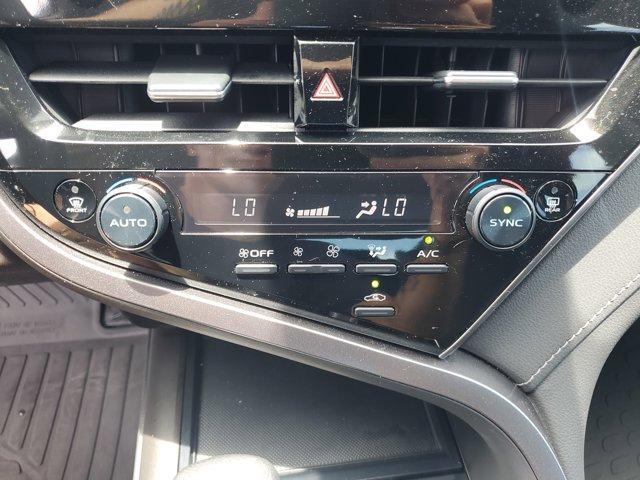 Photo of 2023 Midnight Black Metallic Toyota Camry