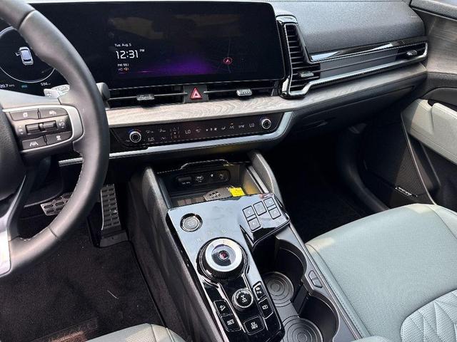 Photo of 2025 Jungle Green Kia Sportage