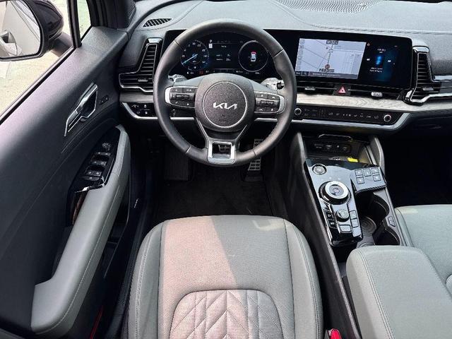 Photo of 2025 Jungle Green Kia Sportage