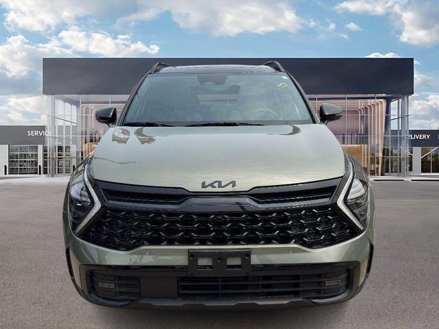 Photo of 2025 Jungle Green Kia Sportage