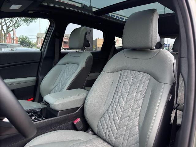 Photo of 2025 Jungle Green Kia Sportage