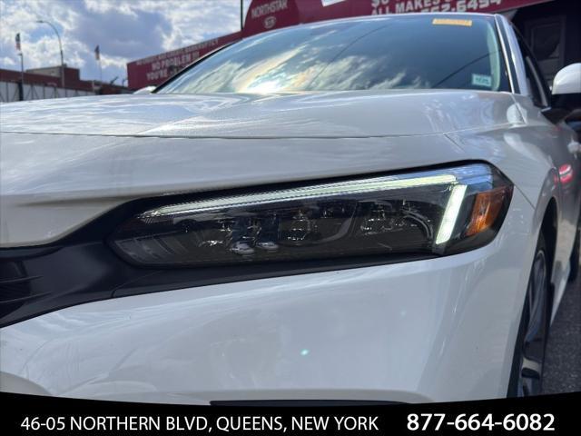 Photo of 2024 Platinum White Pearl Honda Civic