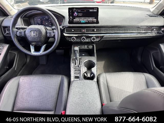 Photo of 2024 Platinum White Pearl Honda Civic