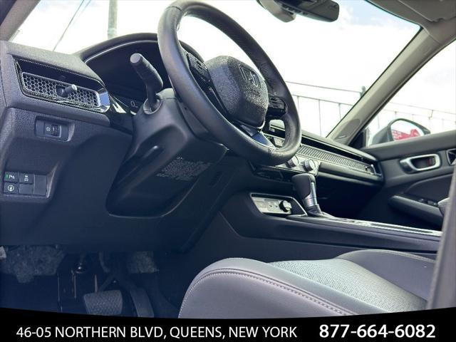 Photo of 2024 Platinum White Pearl Honda Civic