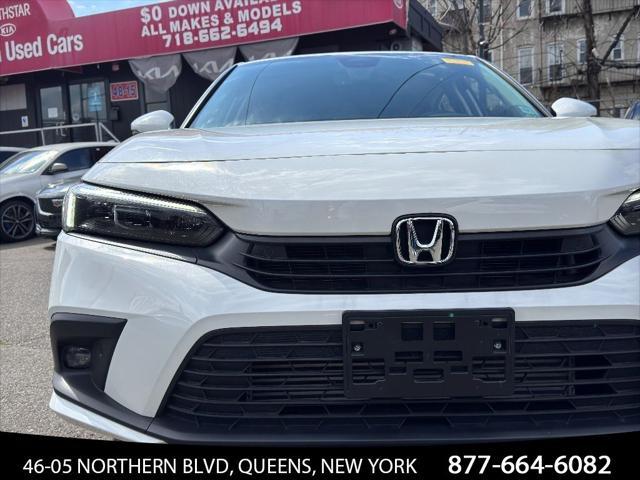 Photo of 2024 Platinum White Pearl Honda Civic