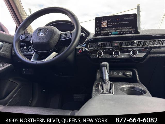 Photo of 2024 Platinum White Pearl Honda Civic