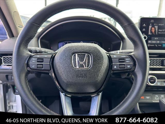 Photo of 2024 Platinum White Pearl Honda Civic