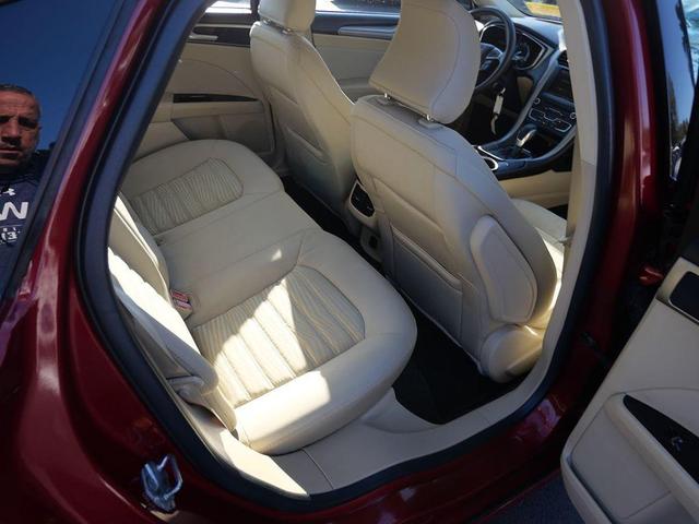 Photo of 2016 Ruby Red Metallic Tinted Clearcoat Ford Fusion
