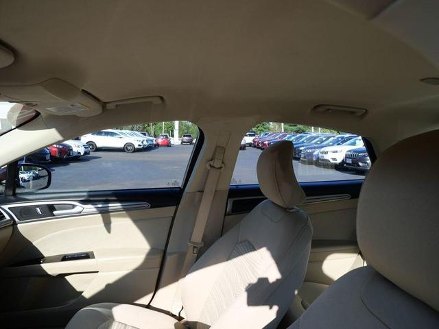 Photo of 2016 Ruby Red Metallic Tinted Clearcoat Ford Fusion