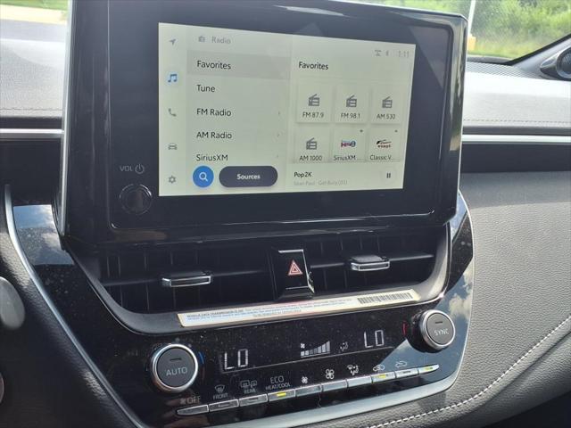 Photo of 2023 Wind Chill Pearl/Midnight Black Metallic Toyota Corolla