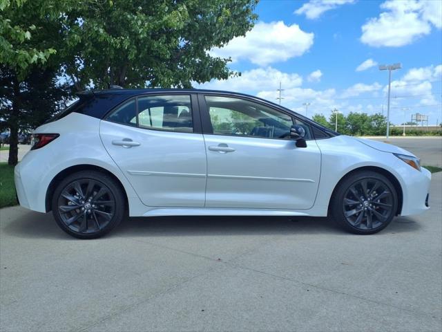 Photo of 2023 Wind Chill Pearl/Midnight Black Metallic Toyota Corolla