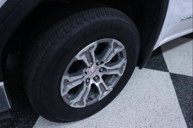 Photo of 2025 Summit White GMC Sierra 1500