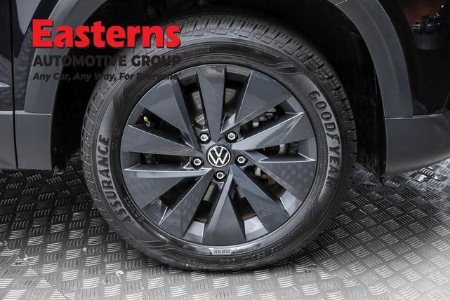 Photo of 2024 Deep Black Pearl Volkswagen Taos