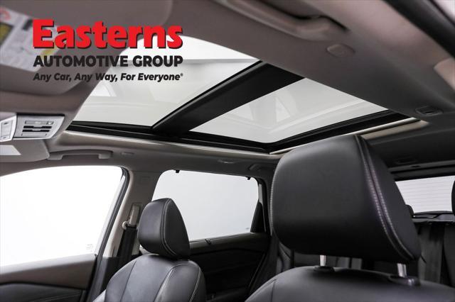 Photo of 2023 Pearl White Tricoat Nissan Rogue